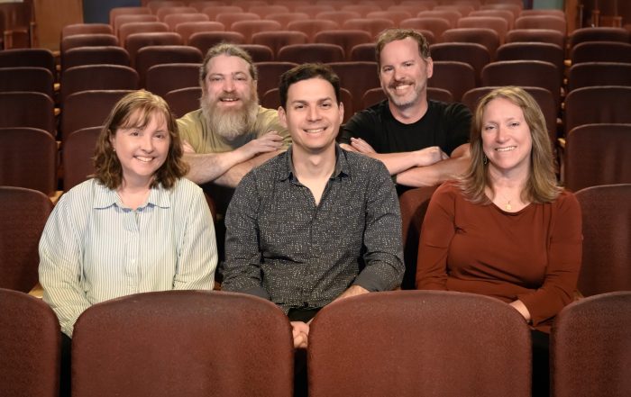 people seated in a theater