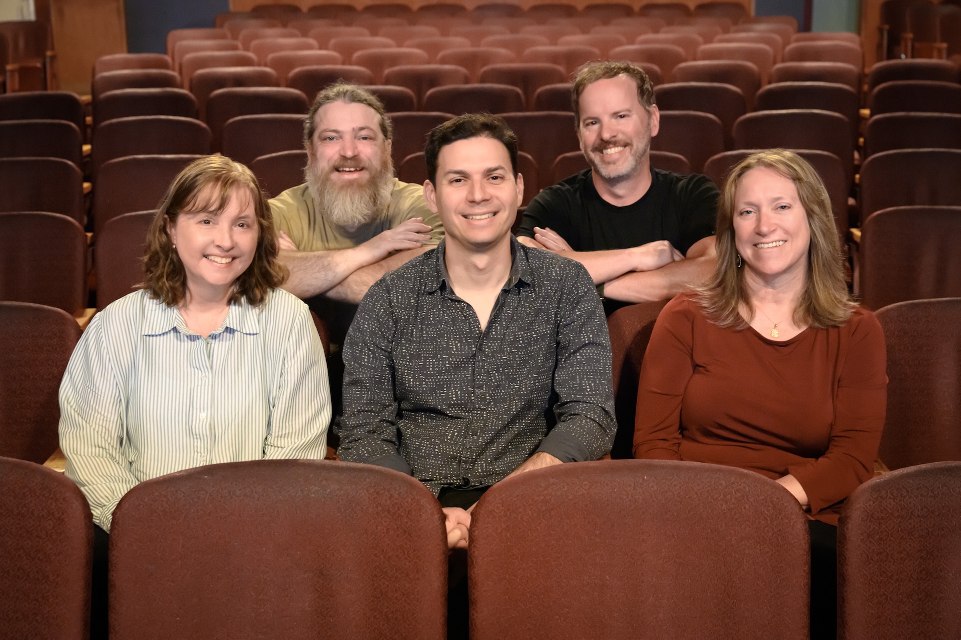 people seated in a theater